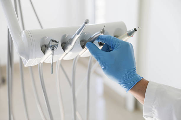Professional Tooth Extraction technician working in Sampson County County, NC